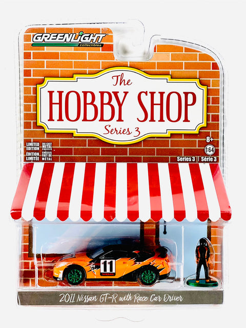 Greenlight the Hobby Shop 2011 Nissan GTR w/ Race Car Driver Chase - Damaged Blister