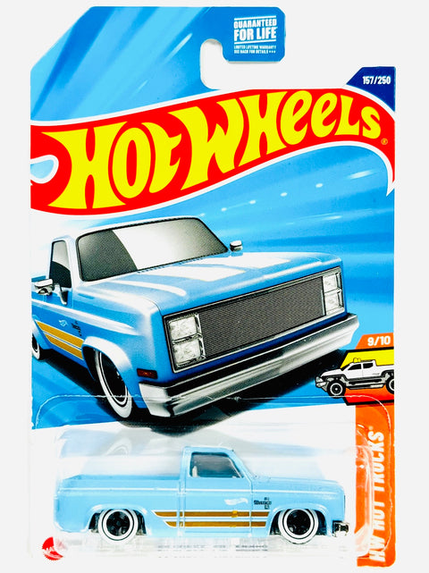 Hot Wheels HW Hot Trucks '83 Chevy Silverado Blue (157/250) - Damaged Card